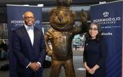 Dr. Marisela Rosas Hemphill and President Brian O. Hemphill, Ph值.D. standing with Big Blue statue.
