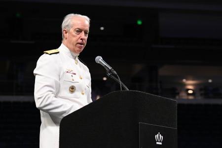 Admiral speaking at podium